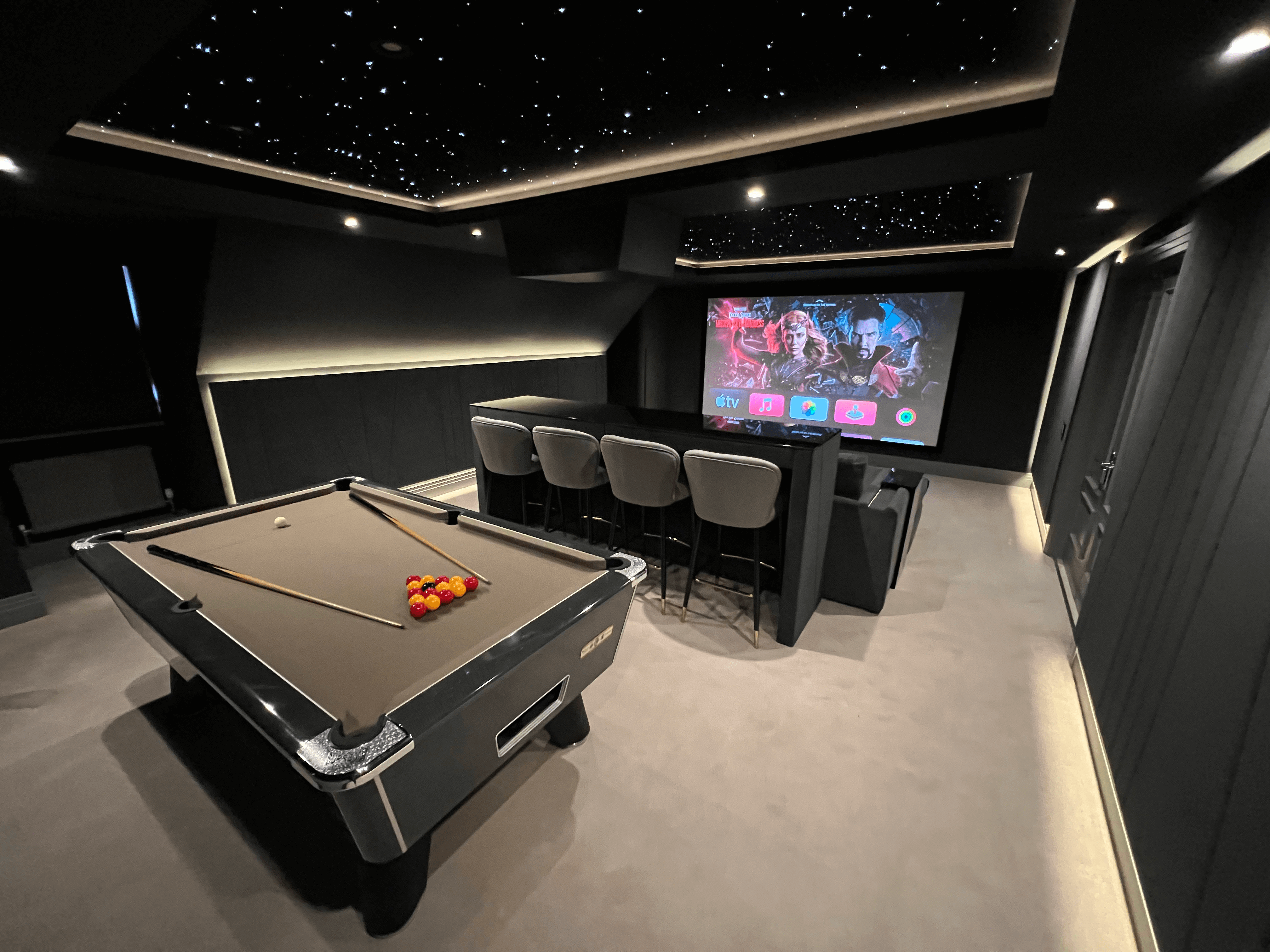 An unused Games Room was transformed into the ultimate luxury entertainment space for sports events  Cinemas and Control Ltd Ascot 01344 944300
