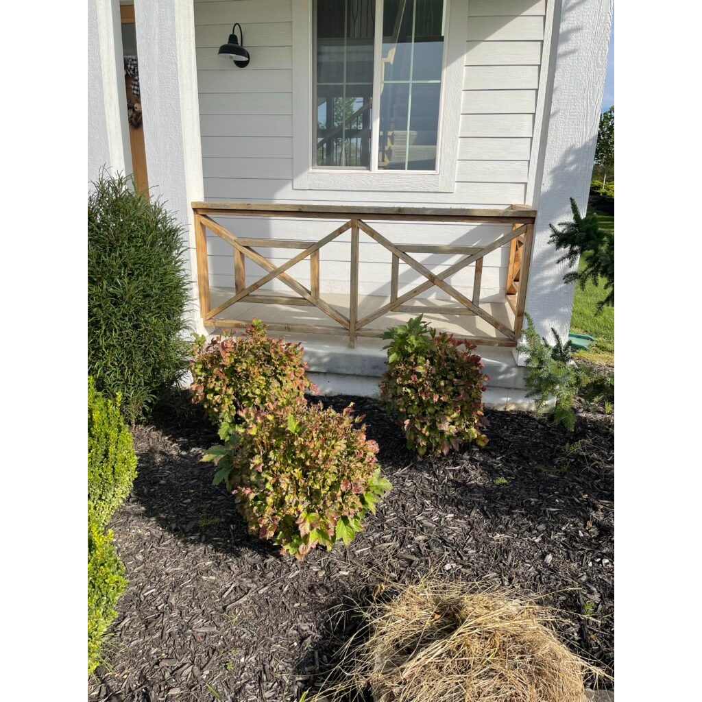 Clean and maintained residential exterior in Kansas City with fresh landscaping and exterior detailing. Professional home exterior maintenance and curb appeal services.