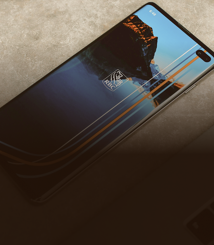 Phone with the RBC Mobile app on the screen.