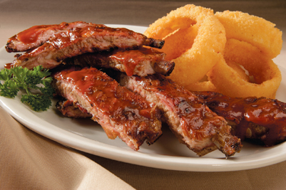 Our tender, meaty Babyback Ribs are hickory smoked with an amazing flavor and a pink smoke ring just below the surface. Each slab is rubbed with our own special blend of spices by our pit experts. A true Kansas City original!