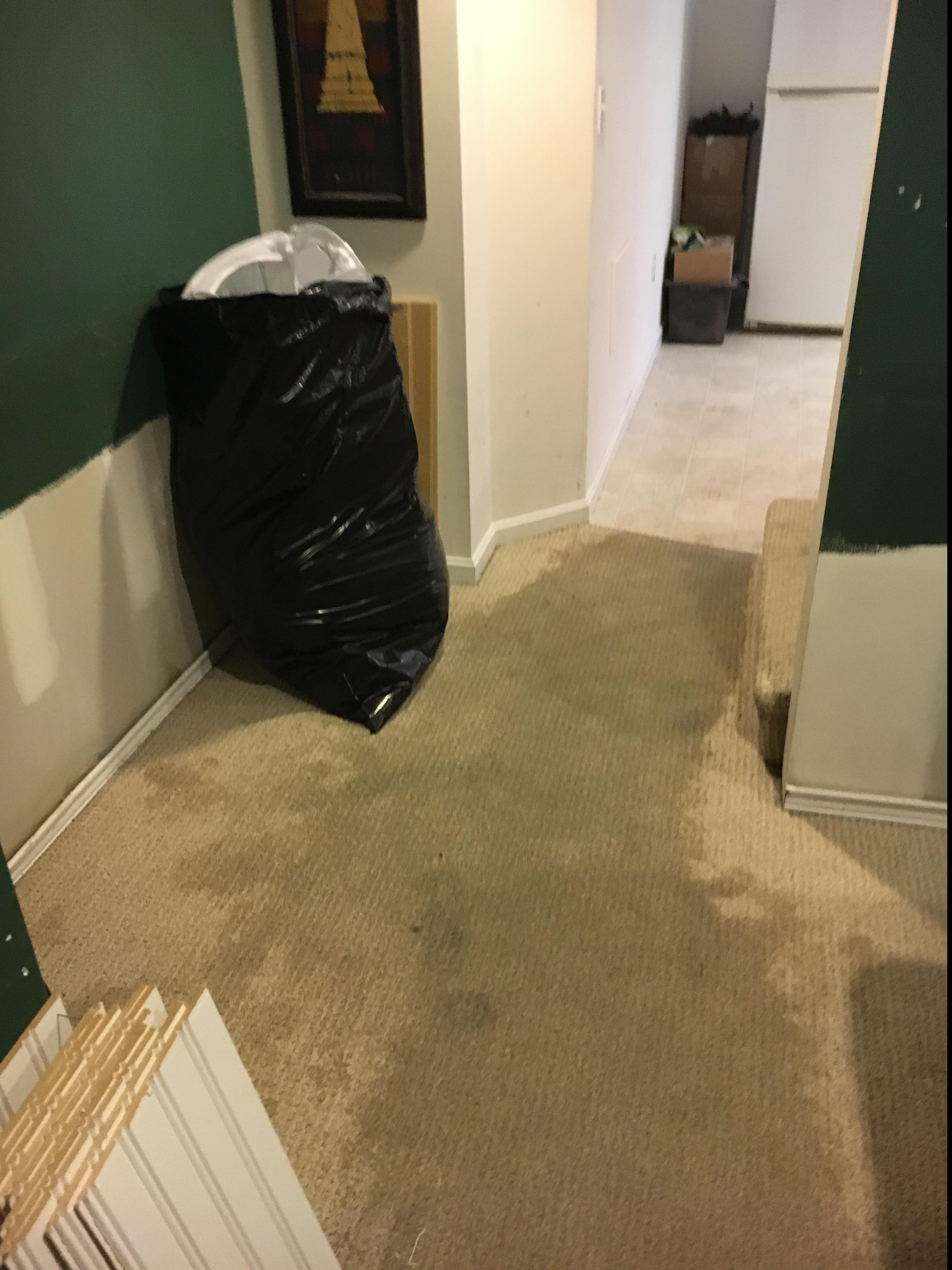 This homes basement experienced water damage after a broken pipe was running for 12 hours. This photo shows the materials bagged up that cannot be restored after the water damage.