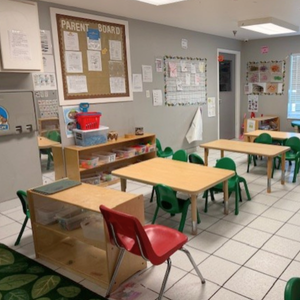 Bright and colorful preschool classroom at Childcare Network with age-appropriate learning materials 