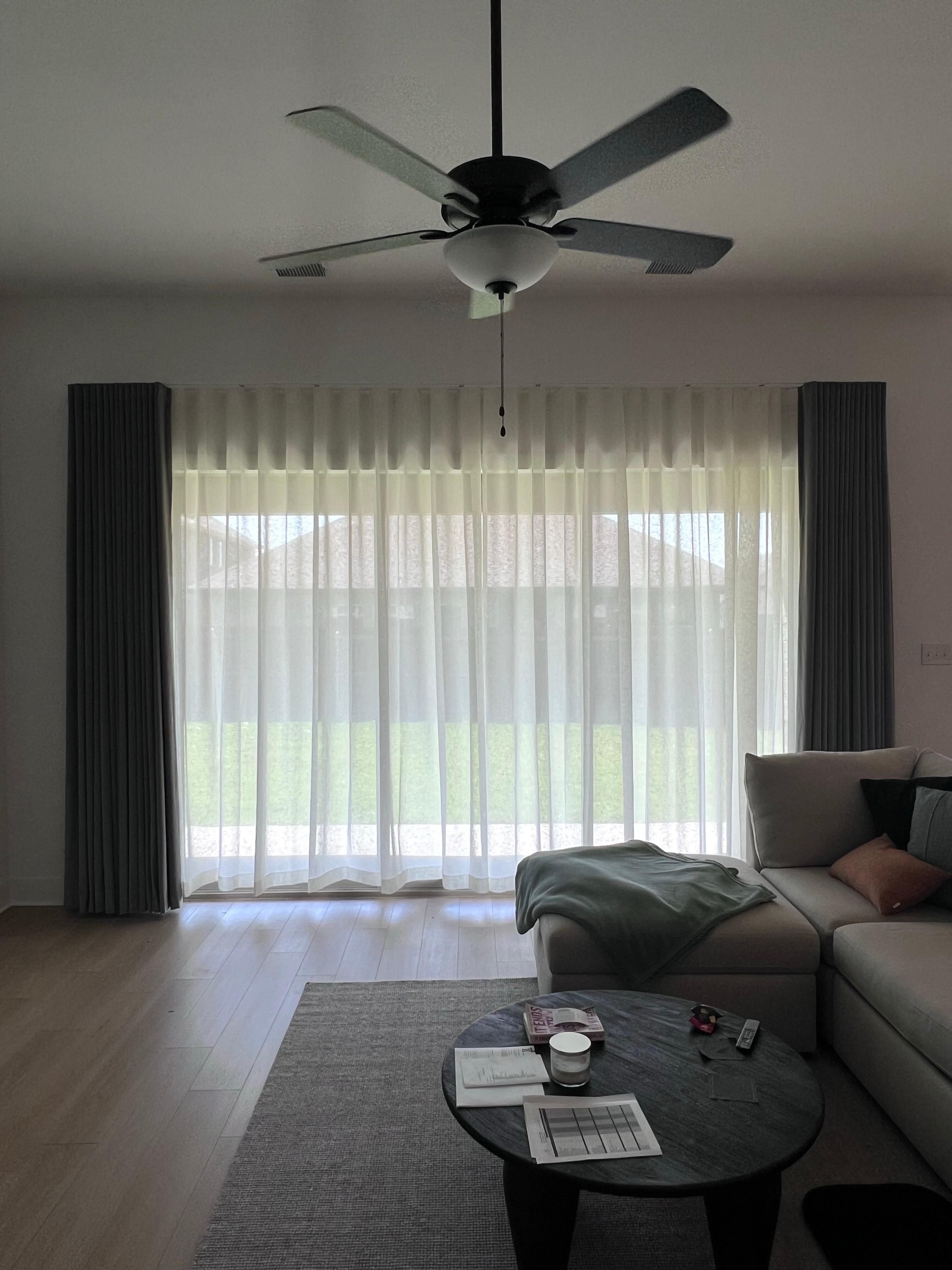 Double Drapery is the best window treatments style for your living room or bedroom! Select the best of both worlds with a sheer and room darkening drapery with the help of our expert drapery team at Budget Blinds of Rockwall, Terrell, and Greenvile.