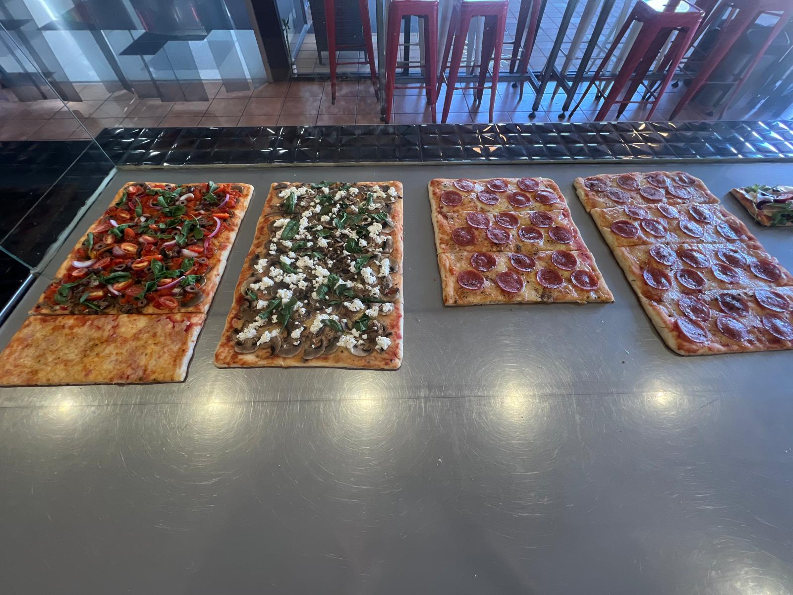 Images Rocket Gourmet Pizza by the Slice