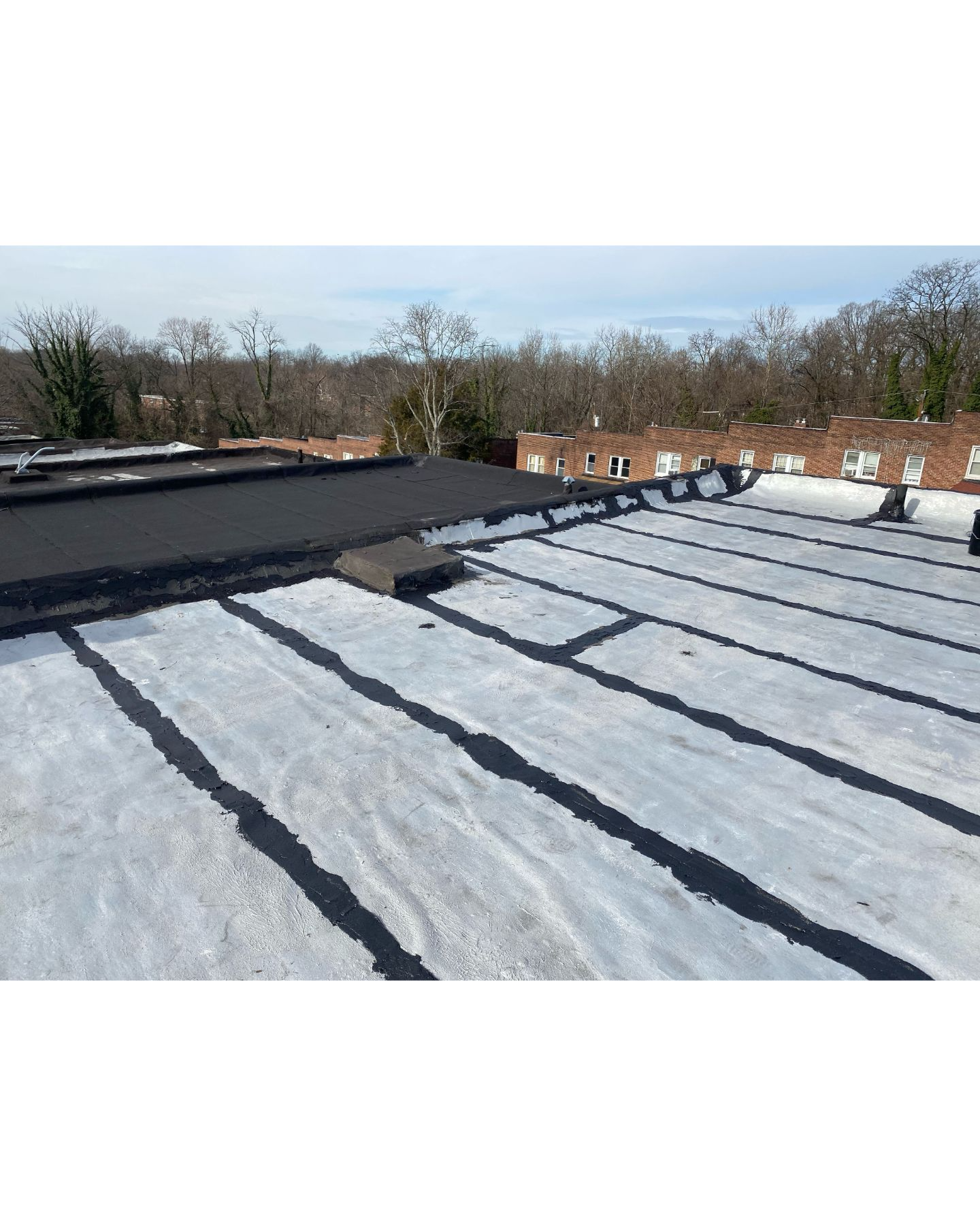 Flat roof repair. Stopped water damage from coming in through the seams on the rolled roof.