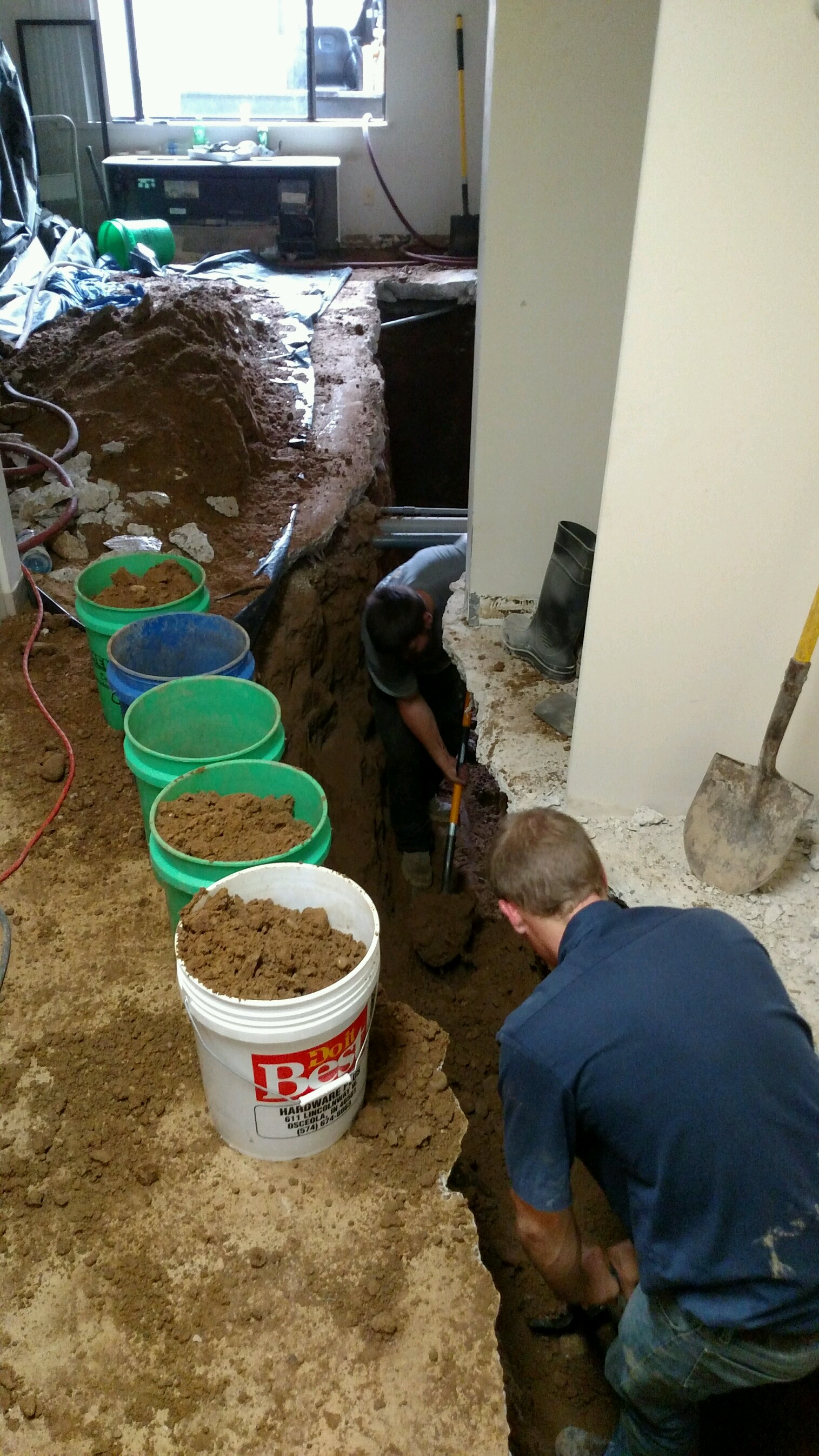 Sewer repair in floor - Jackhammer and excavate down to broken piping to replace.