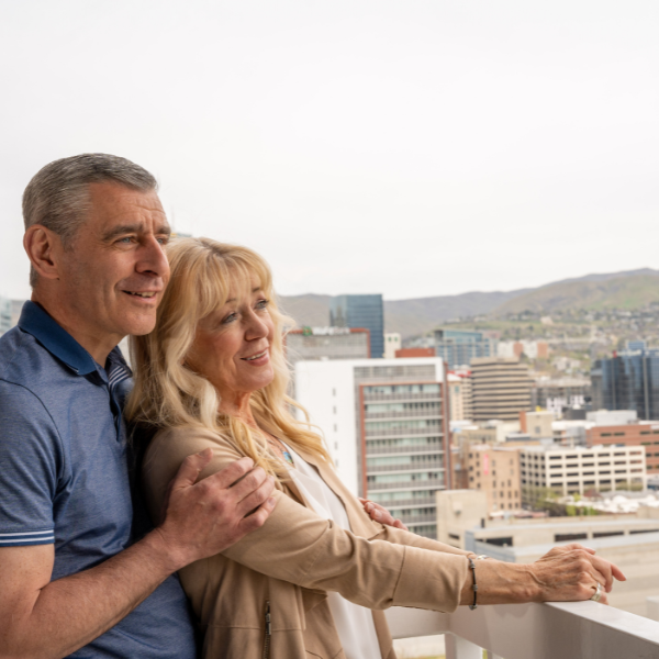 A Couple enjoys city views at the Little America hotel in Salt Lake City. The Little America Hotel - Salt Lake City Salt Lake City (801)596-5700