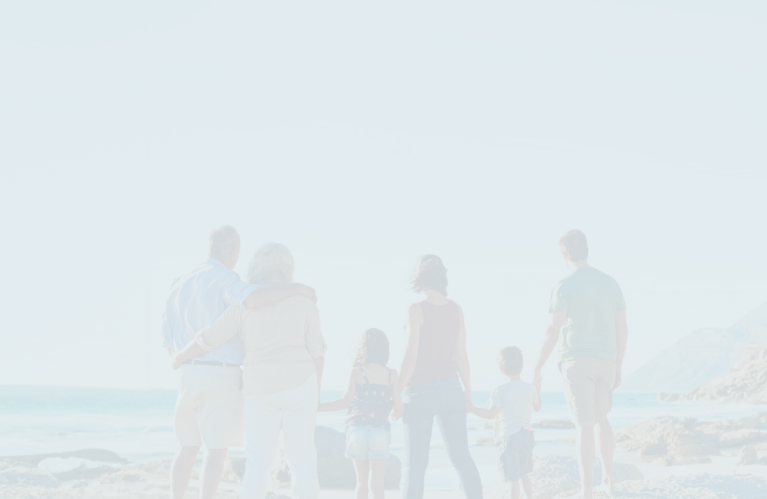 A multigenerational family on the beach.