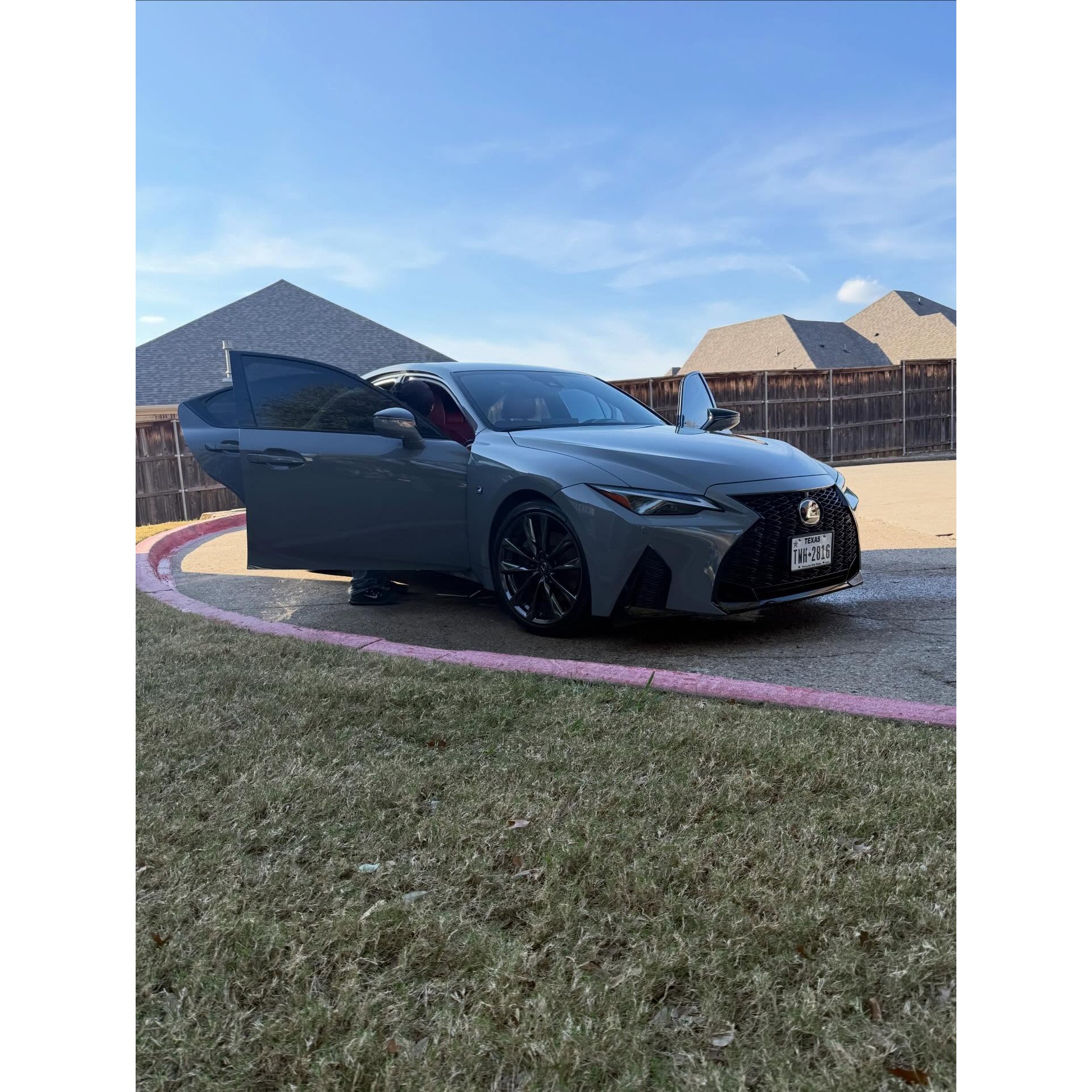 Luxury sedan receiving premium mobile detailing service in Dallas, Texas. Exterior finish cleaned and enhanced for a deep gloss appearance with attention to paint, wheels, trim, and overall vehicle presentation.