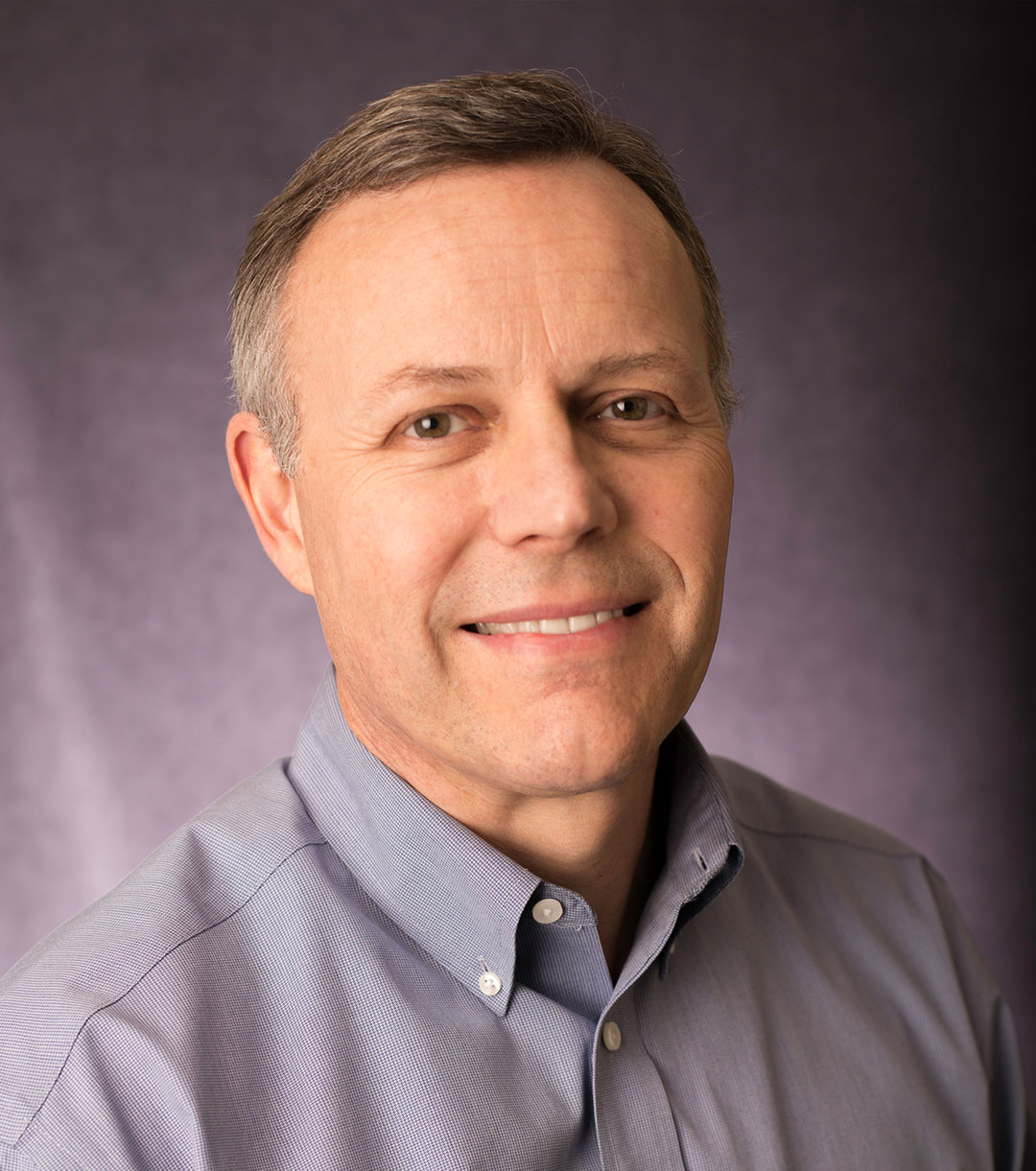 Headshot of Dr. Clive G. Daniels