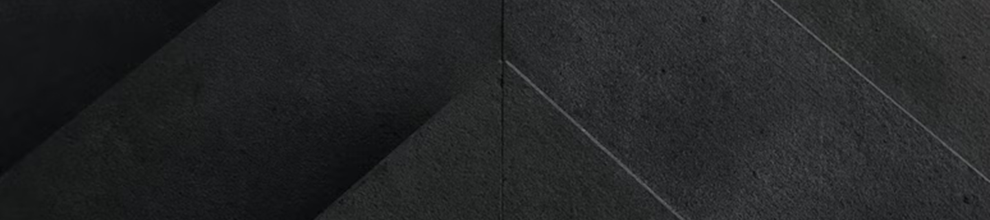 Close-up shot of a layered, angular concrete structure.