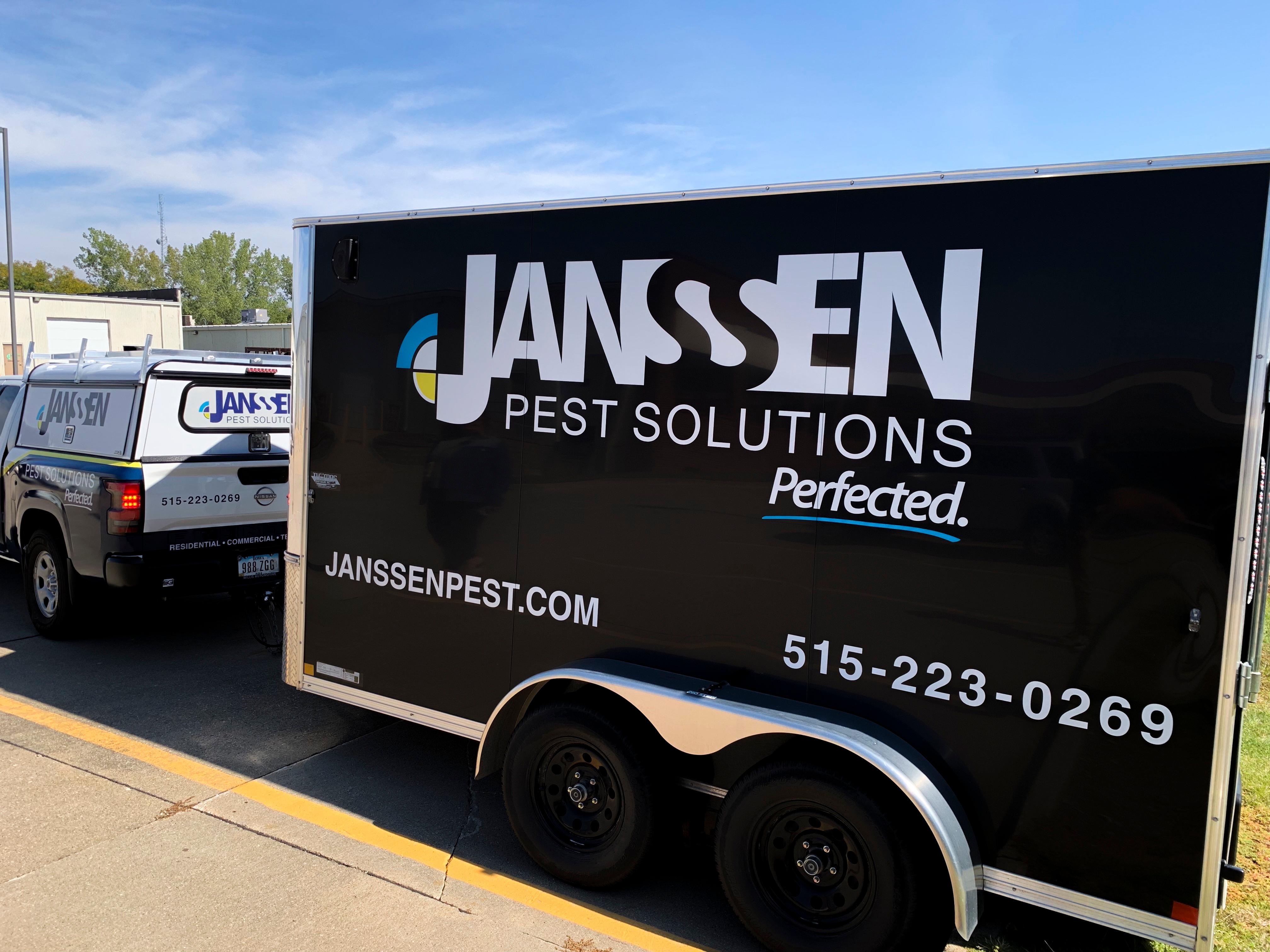 Janssen Pest Solutions work truck outside office in Des Moines.