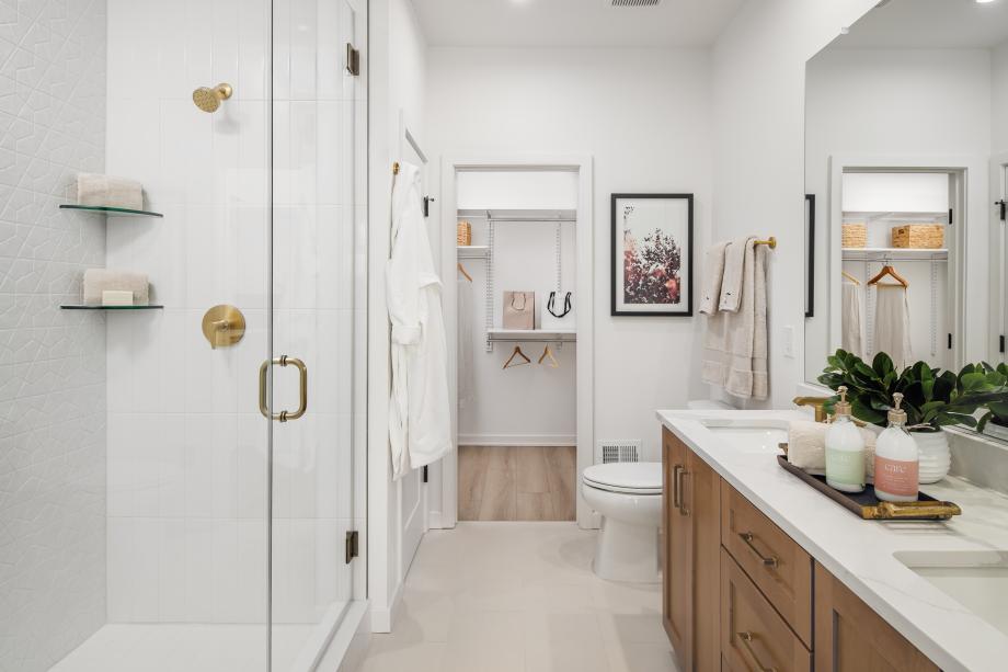 Lavish primary baths with dual sink vanities