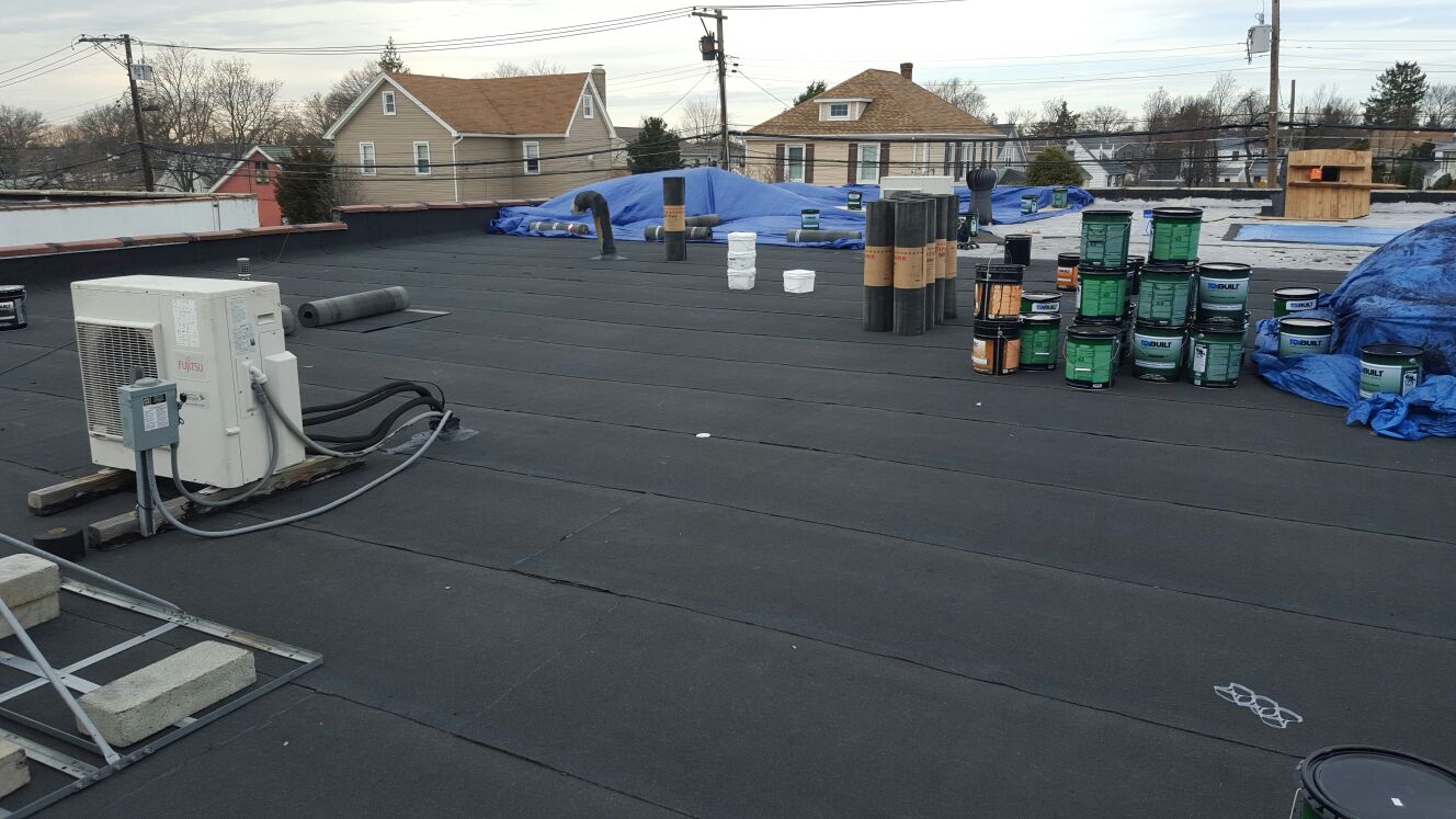 Unseen and often overlooked, flat roofs require routine maintenance and detailed repair to effective Abraham Roofing Lynbrook (800)347-0913