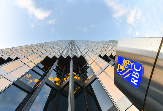 An office tower with the RBC logo, as seen from below.