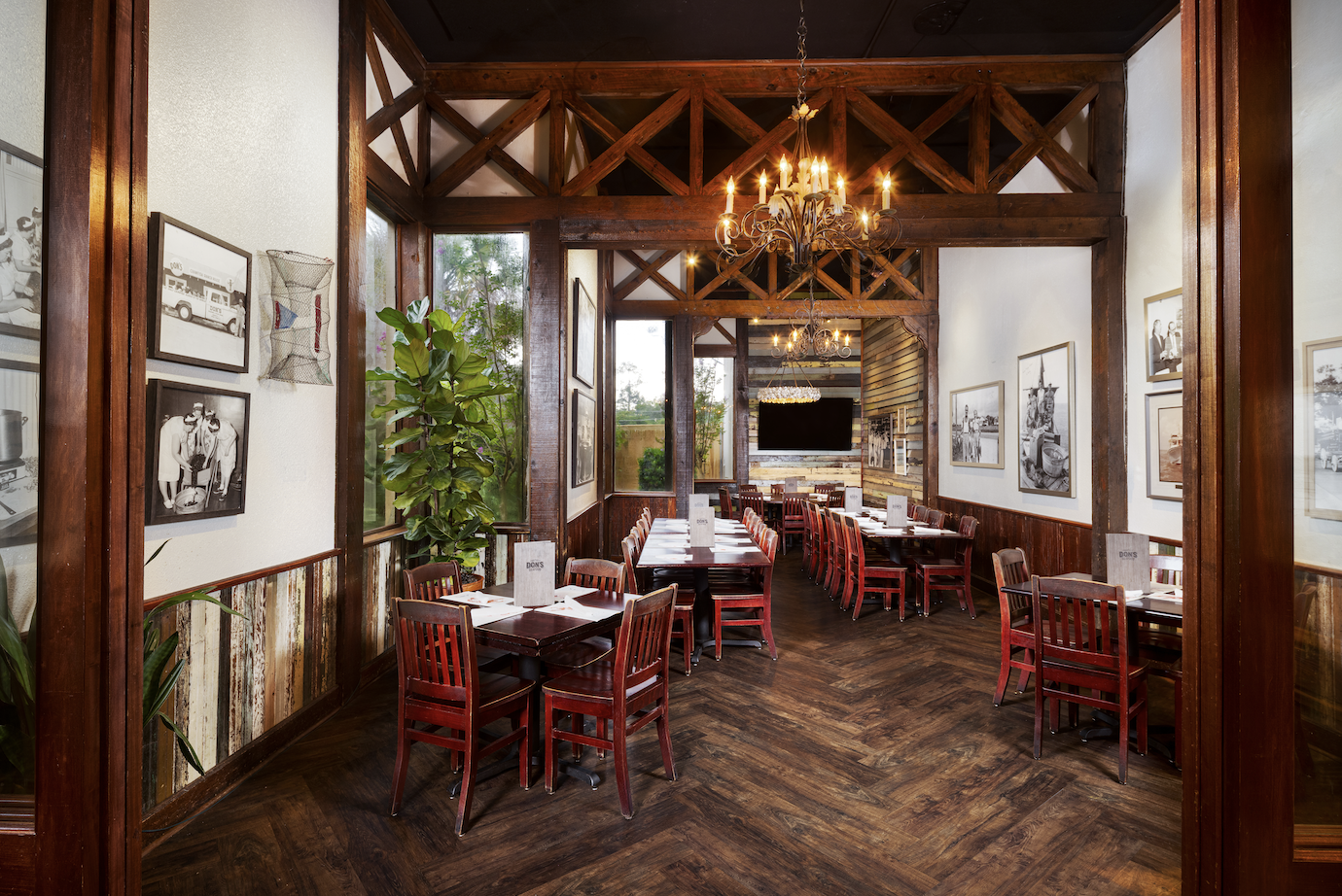 A bright, timber-framed private dining space in Lafayette, arranged with long tables ready for group 
