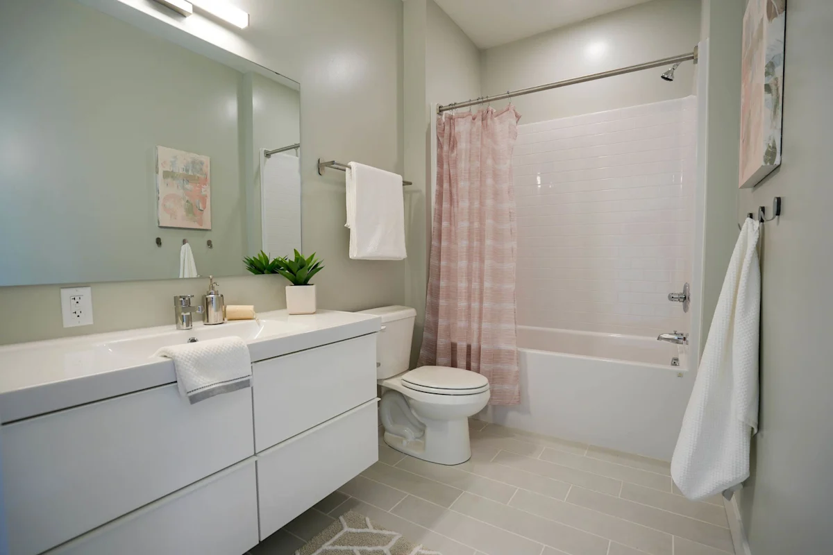 Bathroom with large mirror