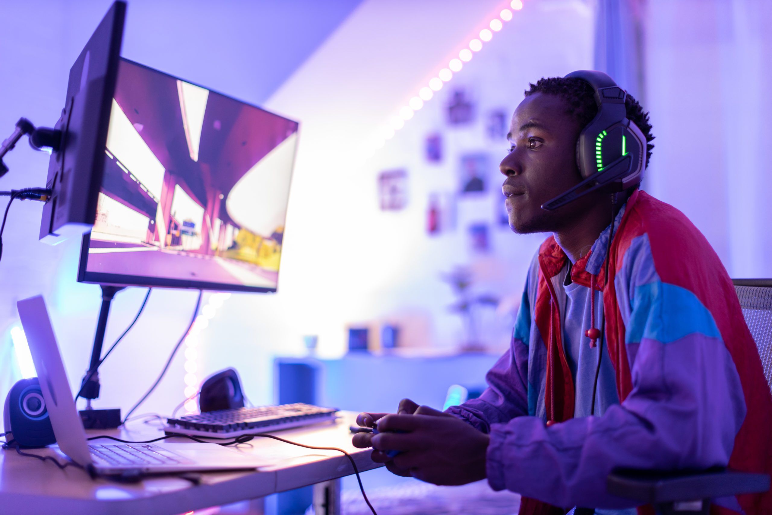 young man playing video games on a computer