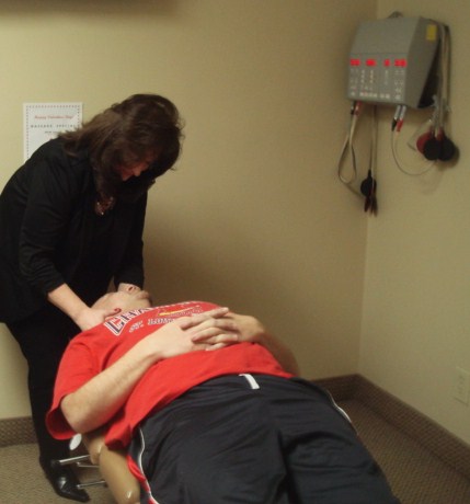 Dr. Helene Levinson, D.C. Adjusting a Patient