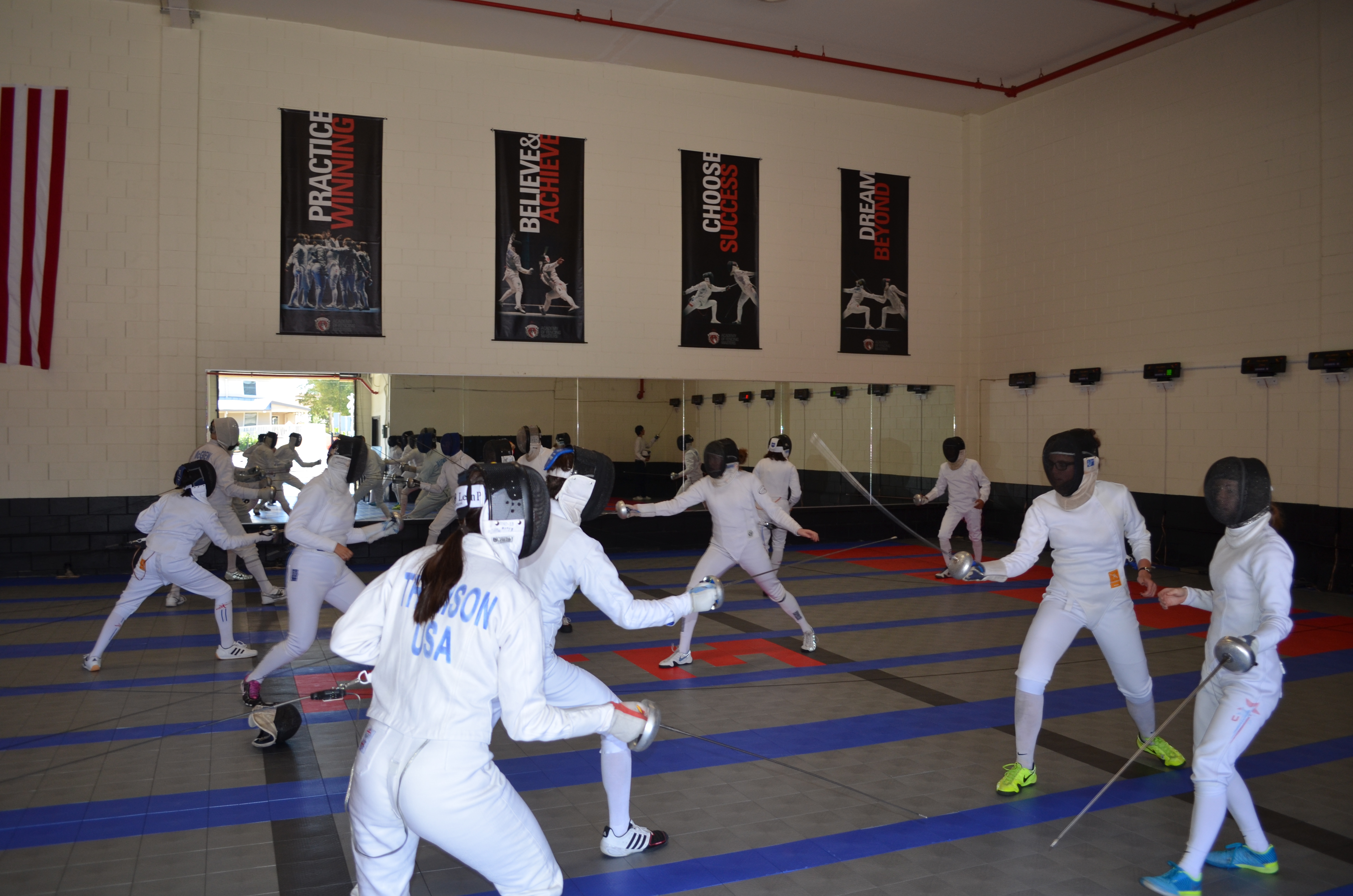 Epee bouts in Academy of Fencing Masters, Campbell, CA