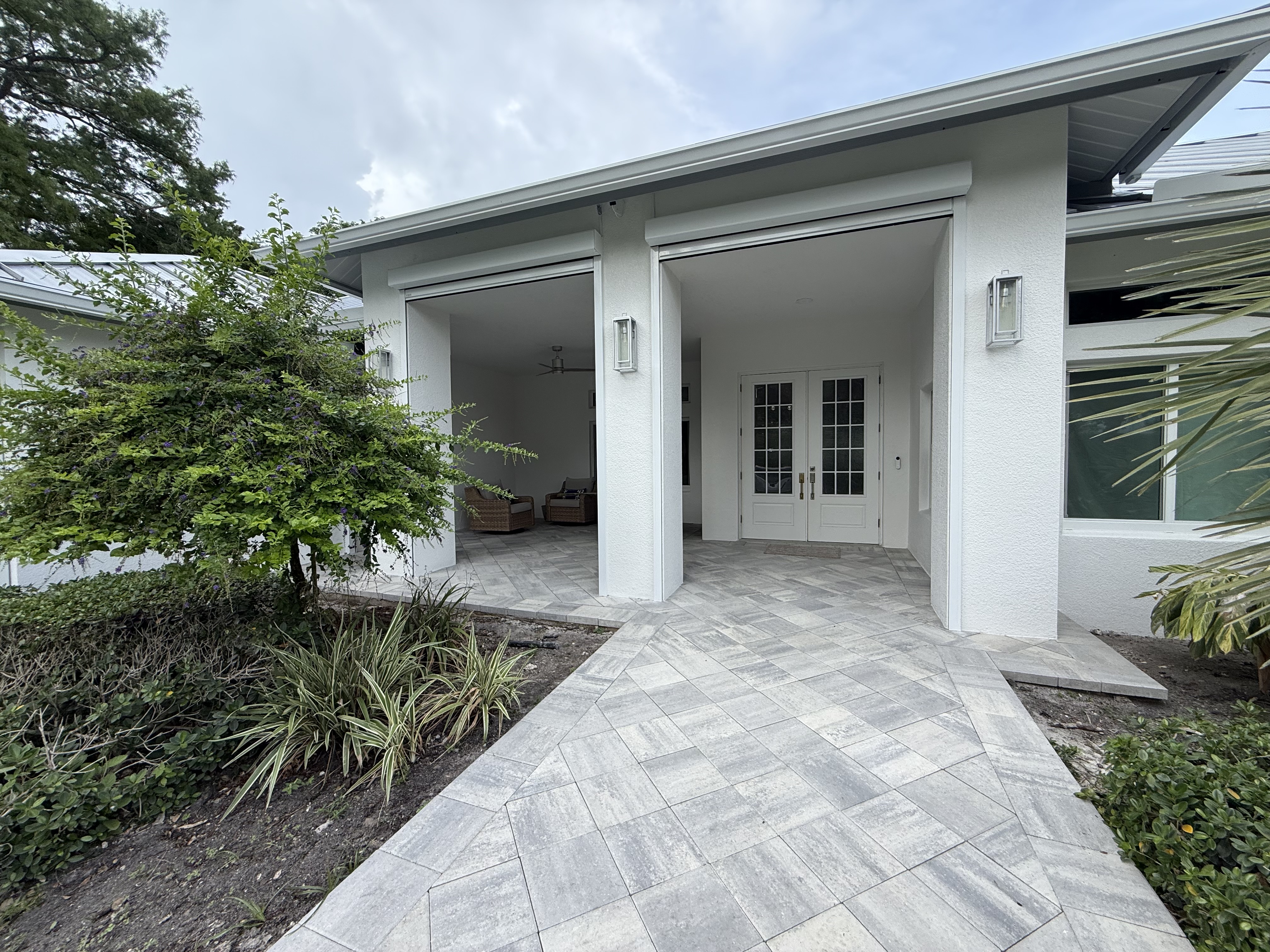 Front Entry with Motorized Screens in up position