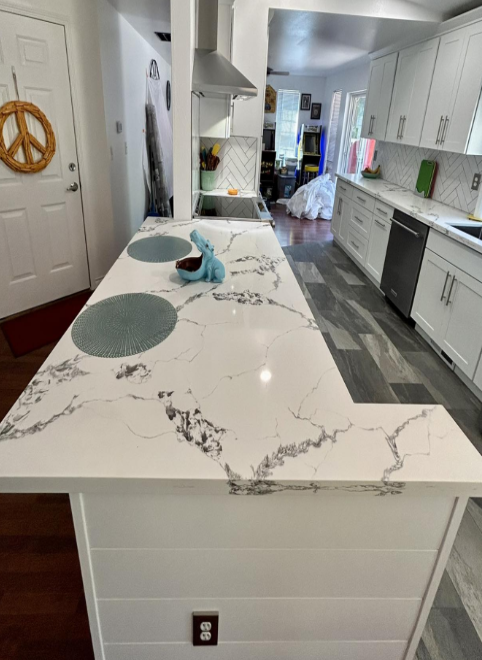 Kitchen remodel with finished granite countertop. Project completed in Des Moines, WA