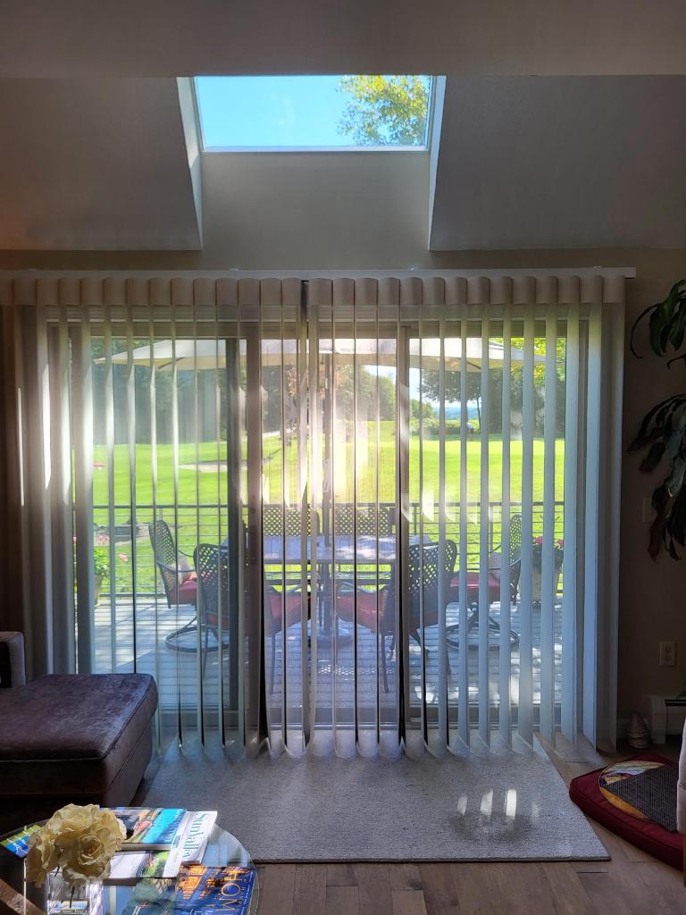 Vertical blinds for sliding glass doors allow you to control your privacy, as well as your lighting.