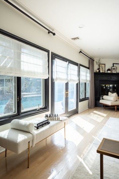 Create your dream living room with our gorgeous roman shades! We absolutely love the way these pristine roman shades complement the furniture and decor in this beautiful living room. Notice how these shades let in the perfect amount of soft natural light, while providing ample shade and privacy.