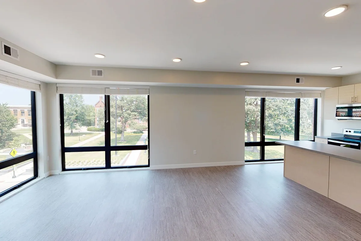 Spacious living room with large windows