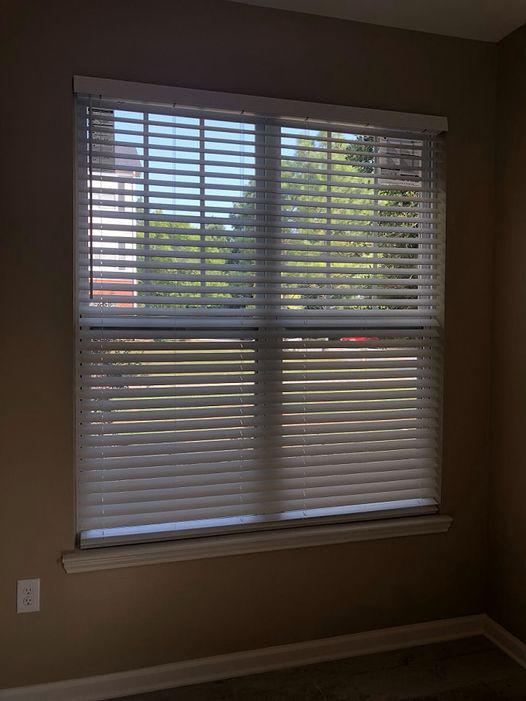Need a solution to show off your apartments? In this Kennesaw building, we installed Faux Wood Blinds—and the results are just right for open houses and more. #BudgetBlindsKennesawAcworth #FauxWoodBlinds #CommercialBlinds #FreeConsultation #WindowWednesday
