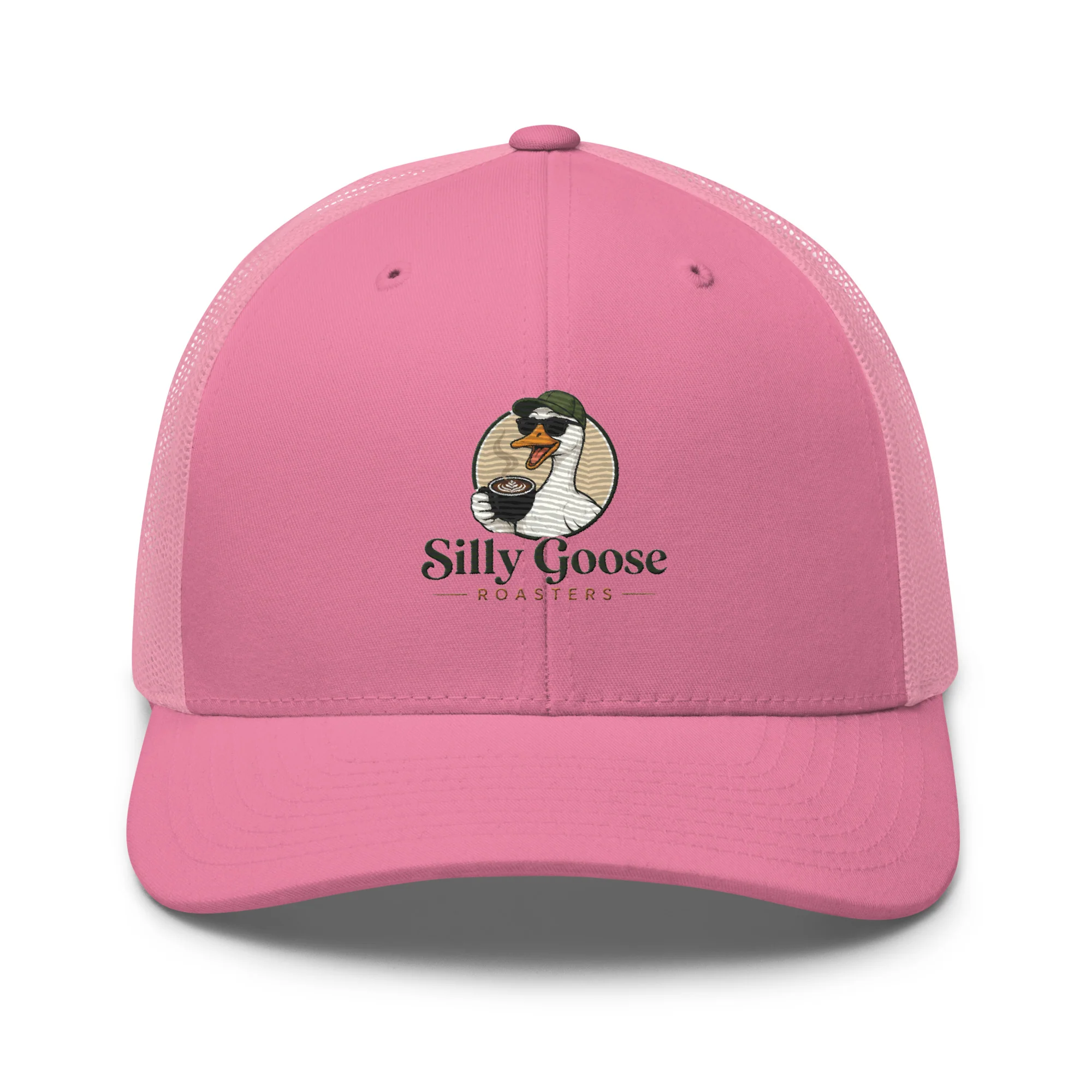 A pink trucker hat with a graphic design on the front. The design features a cartoon goose wearing sunglasses and a green hat, holding a cup of coffee with latte art. Below the goose, the text "Silly Goose ROASTERS" is printed.