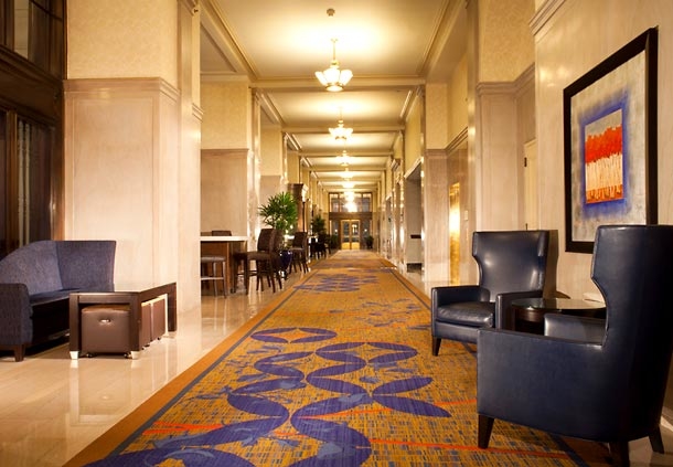 The history style at the Courtyard Philadelphia Downtown features 11 foot ceiling, polished marble, and classic wood accents.