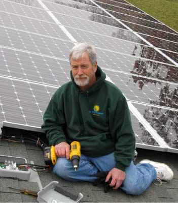 Star City Solar LLC's owner with roofing solar panels in Dayton, OH.