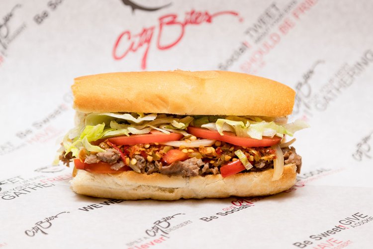 Grilled sirloin steak, melted provolone, grilled onions & peppers, crushed cherry peppers, lettuce, tomatoes, mayo, salt & pepper.