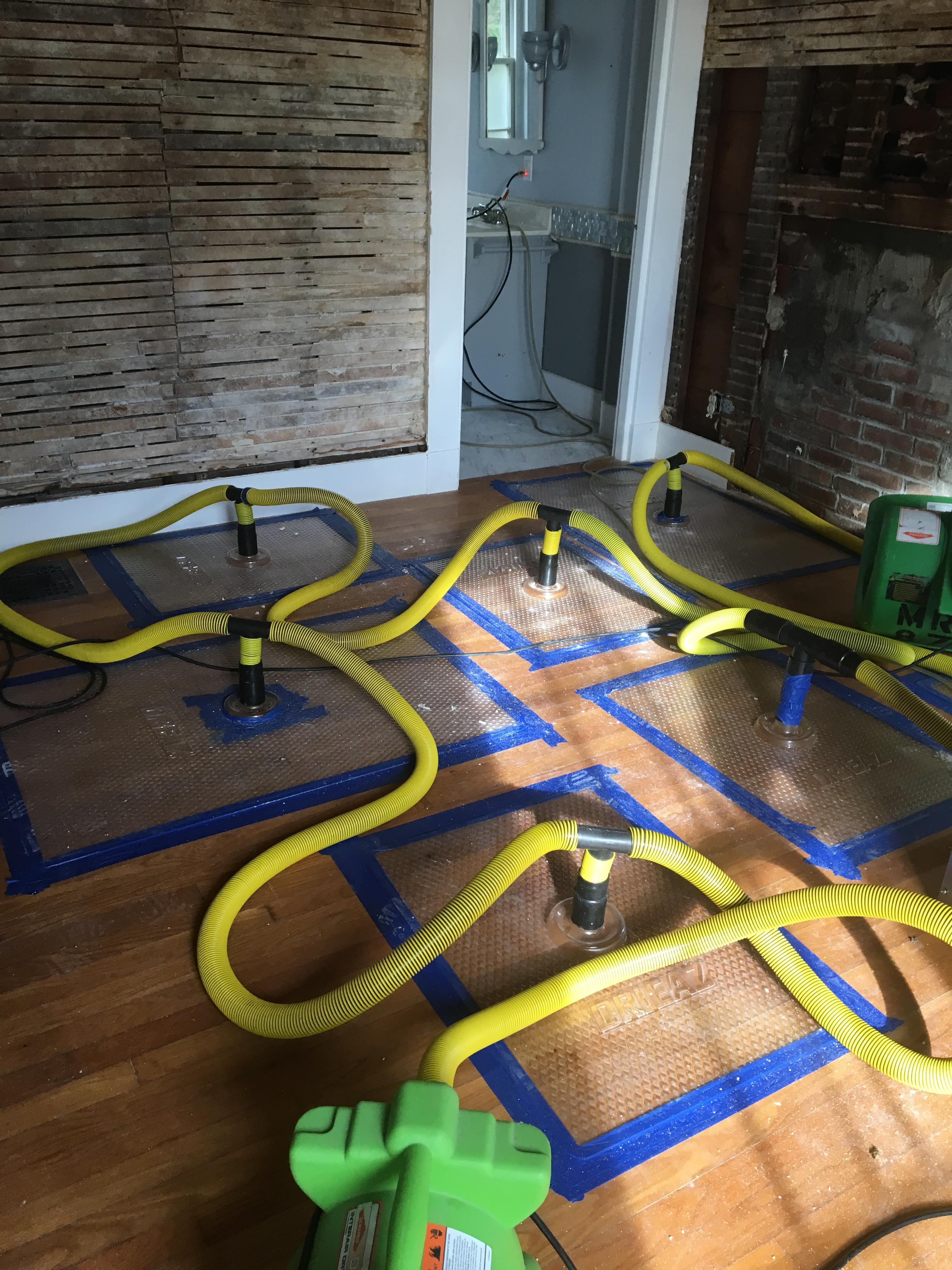 The floor mat system is in place to ensure save the wood floors after a water loss.