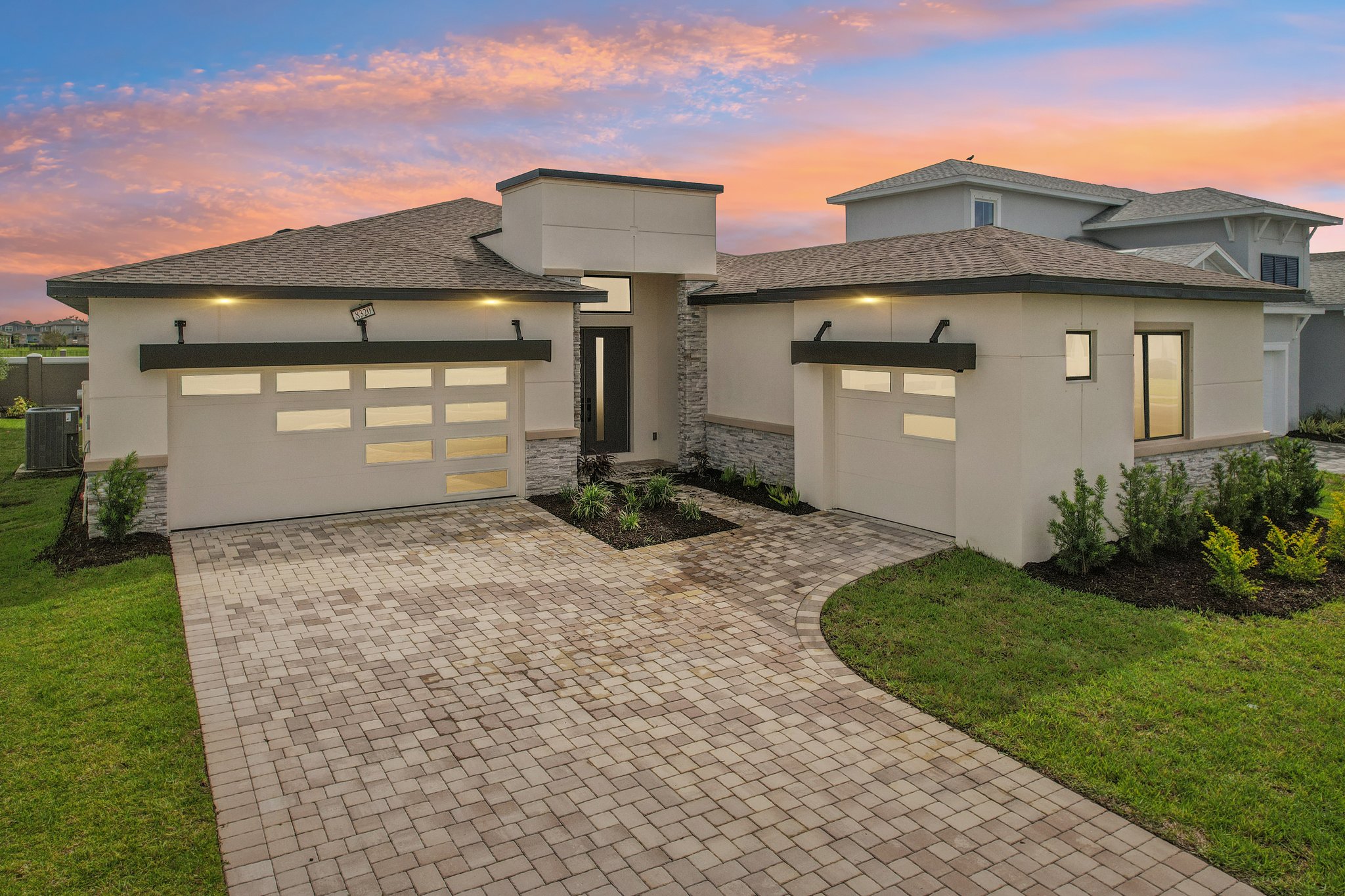 The Front Elevation of a DRB Homes Quick Move-In Home at Biscayne Landing at Seaire in Parrish, FL.