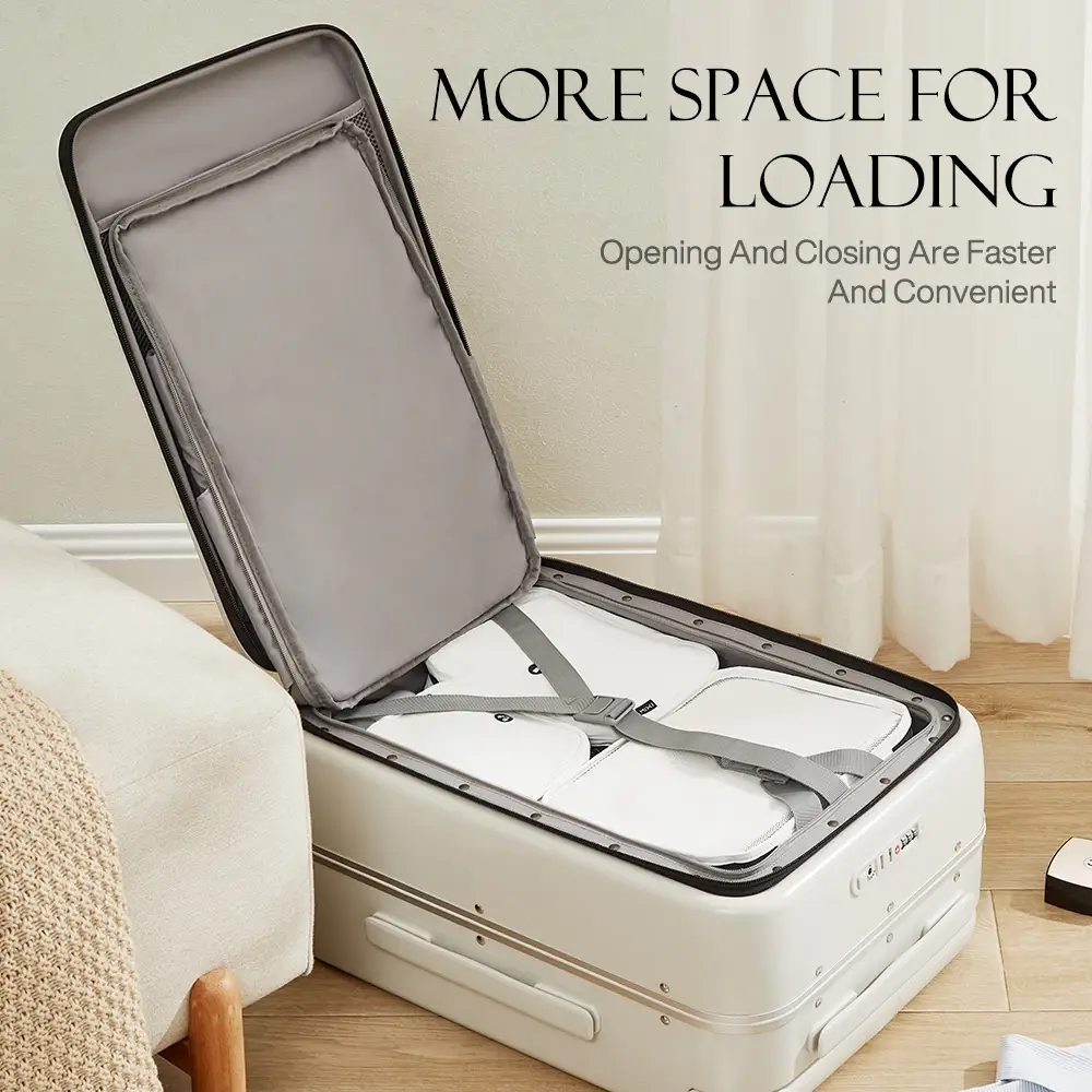 An open white suitcase filled with four white packing cubes, secured by gray straps. The suitcase is placed on a wooden floor next to a cream-colored armchair with a woven blanket draped over it. The background features light beige walls and sheer white curtains. Text overlays read "MORE SPACE FOR LOADING" and "Opening And Closing Are Faster And Convenient."