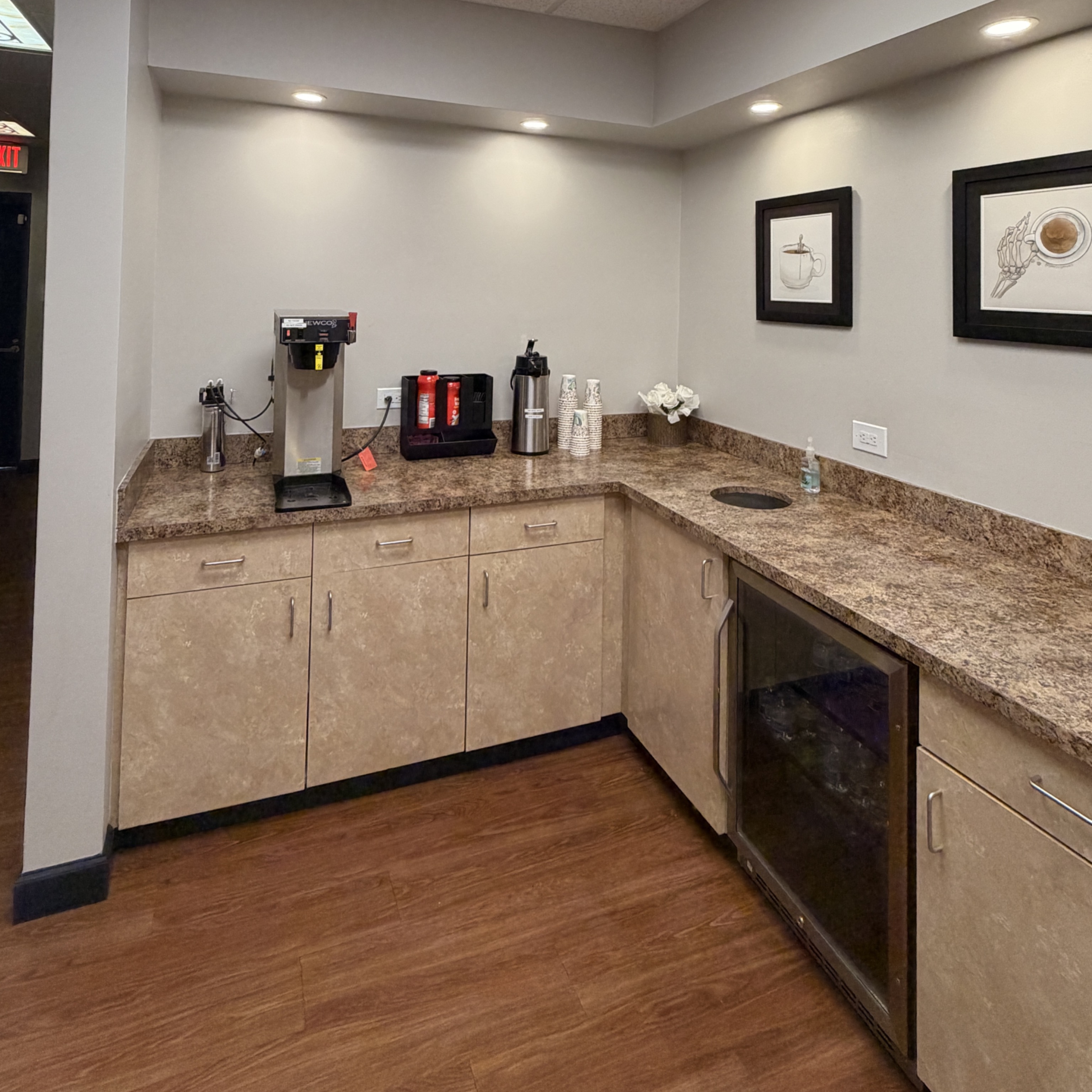Enjoy complimentary coffee and cold drinks at our coffee bar while you wait. 