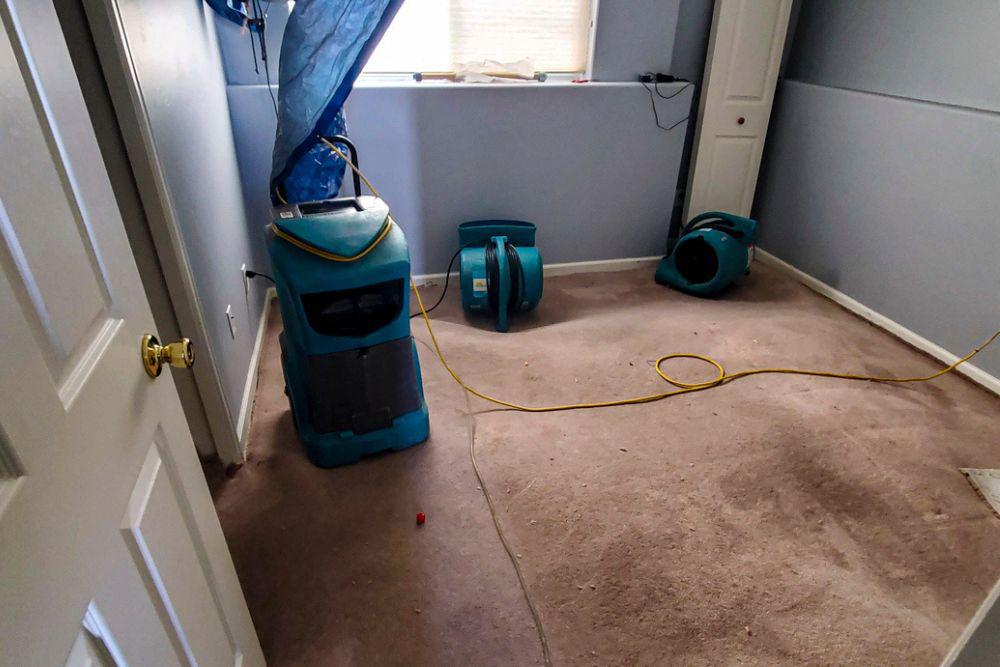 Pictured here is Danbury water damage.  This home has a lookout basement on grade and has no drain tile.  After a torrential rainstorm, the basement flooded.