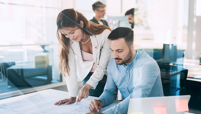Business owners working together on a project.