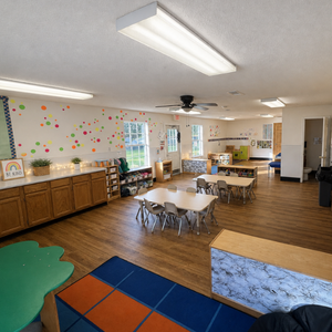 Bright and colorful preschool classroom at Childcare Network with age-appropriate learning materials