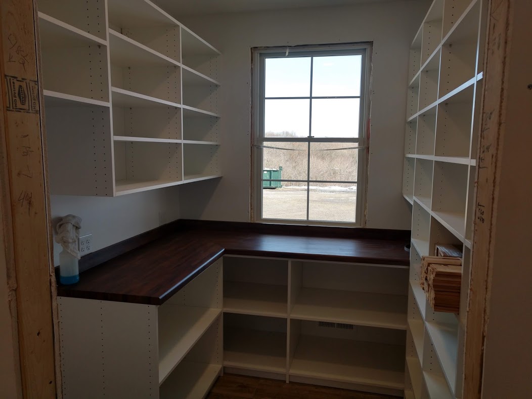 Custom kitchen pantry with custom countertop in Bellwood