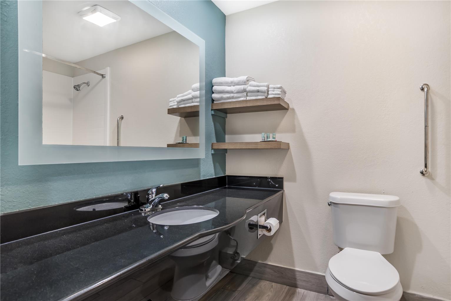 One King and Two Queen Bedroom - Bathroom