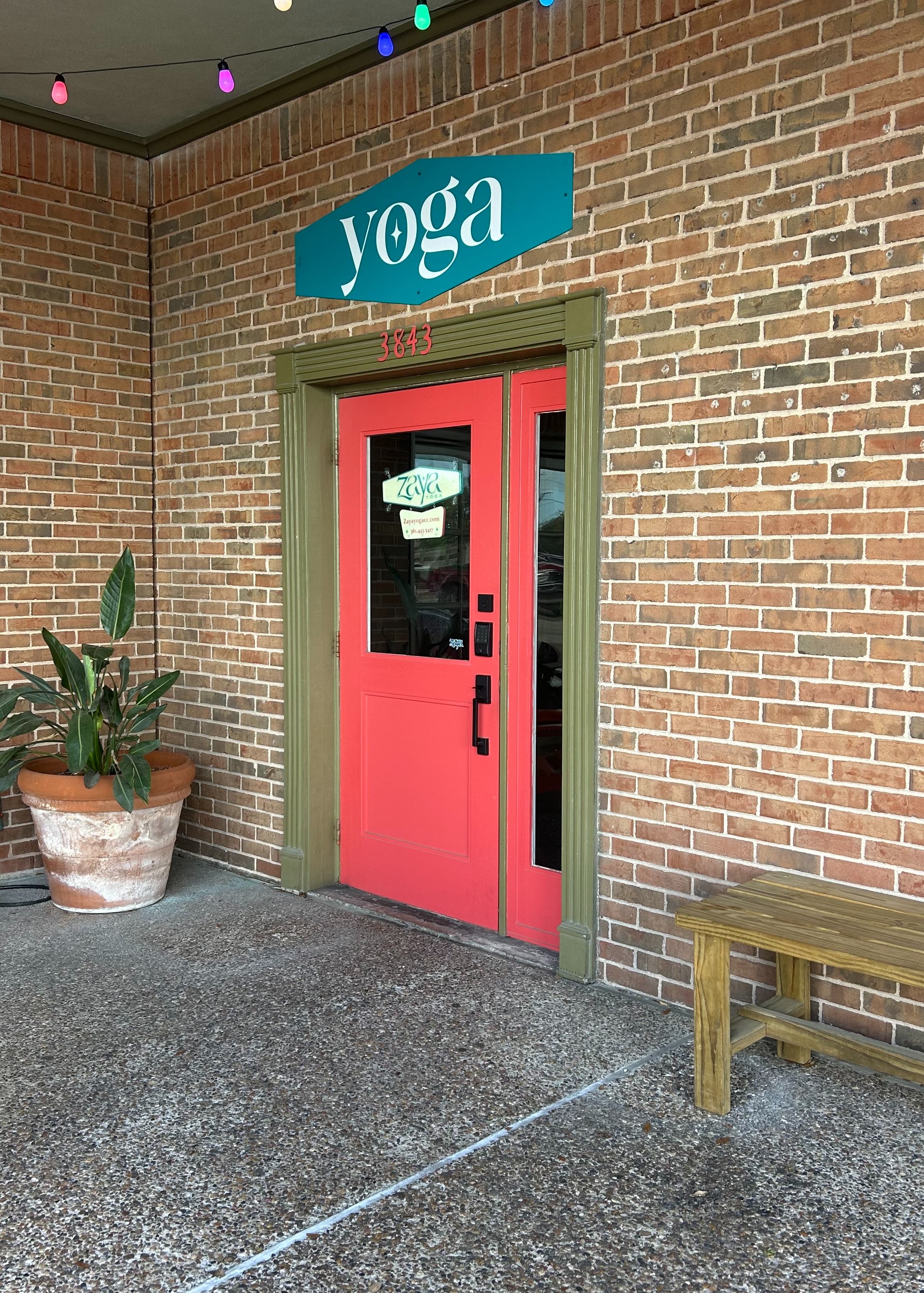 Welcome! This is the entrance to Zaya Yoga, our beautiful boutique studio in Corpus Christi, Tx. Just through those brightly colored doors, your peace calm and serenity awaits. If the class is Vinyasa, Ashtanga, beginner, restorative or Fundamentals, you will be lead in a practice that will respect both your body and your mind. Come see us.
