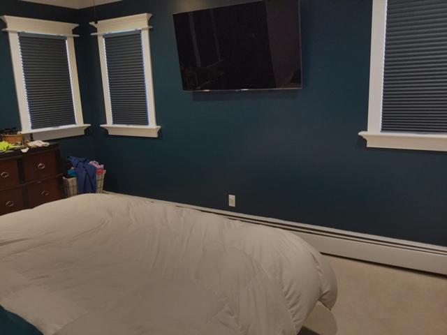 This Ossining bedroom looks so inviting and relaxing! Our Blackout Honeycomb Shades ended up being the perfect option for these windows! They’re a great match, and they keep the light out!