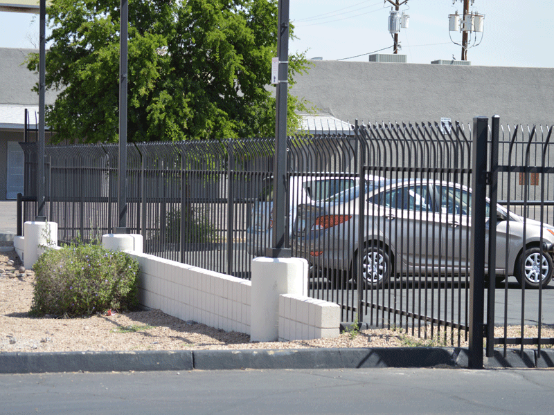 8ft tall curved spear top wrought iron fence Fence AZ Mesa (623)289-6702