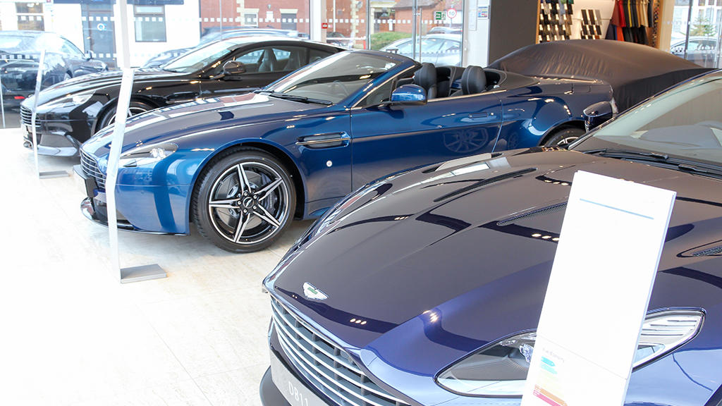 Cars inside the Aston Martin Wilmslow dealership