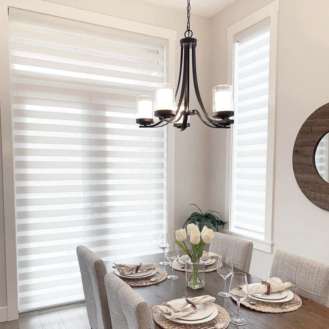 Dual sheer shades feature two layers of alternating horizontal bands, one being sheer and the other opaque. With these shades, you can align the bands for openness, adjust for filtering light, and overlap for privacy!