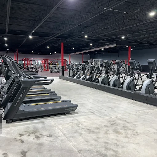 Cardio equipment row at 24 Elite Gyms Nevada, one of the best gyms offering 24-hour fitness center access. Join the top health club in Nevada, MO today.