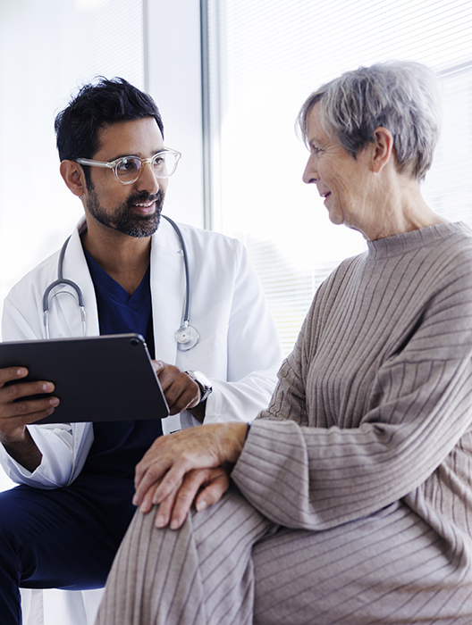 A doctor talking to a patient about Dialysis maintenance